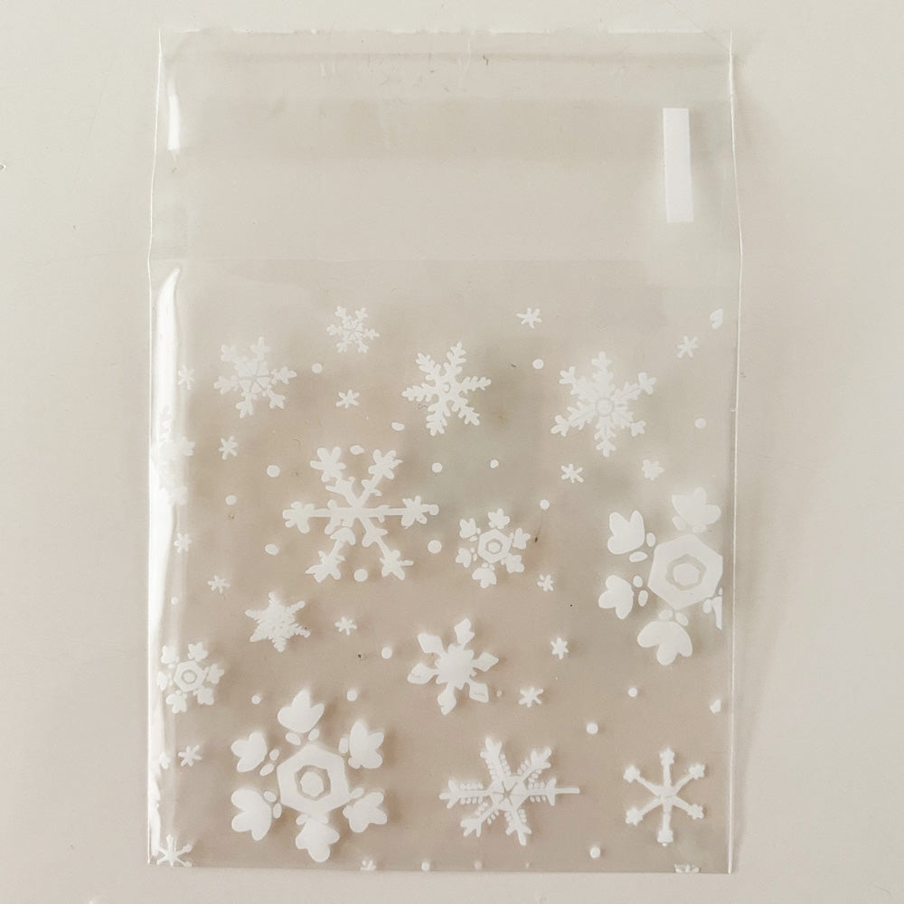SCHNEEFLOCKEN - Verpackung für Zauberkerze