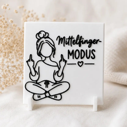 Ein kleines Schild mit «Mittelfinger-Modus» Botschaft 