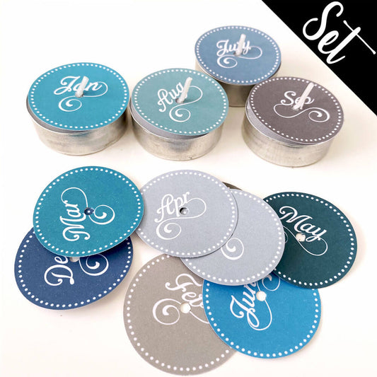 12 Teelicht-Deckel | Monate blue